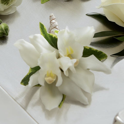 White Mini Cymbidium Boutonniere – M & R FLOWER AND GIFT SHOP, Lancaster CA